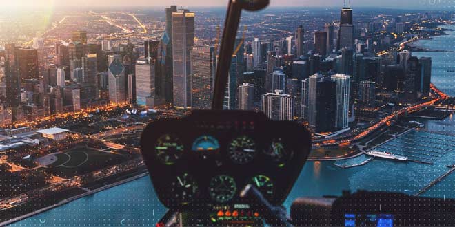 A birds eye view of a city from a helicopter 