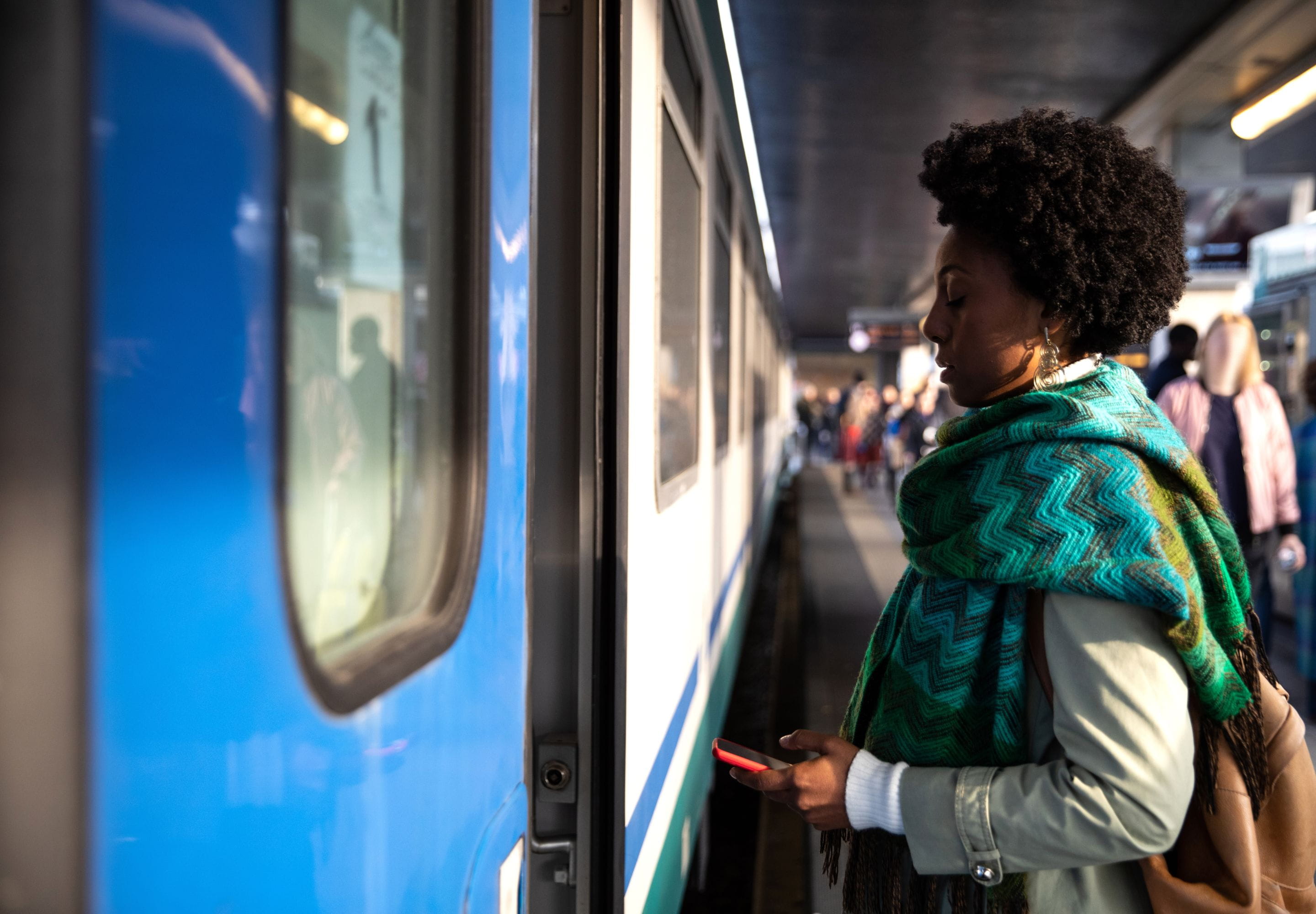 Woman standing on a train platform