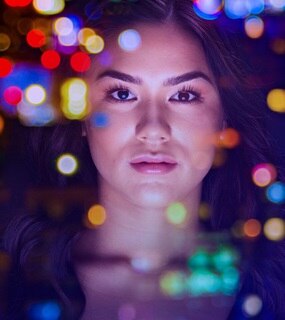 Lady with colourful lights